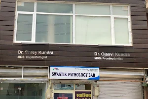 Kundra dental image