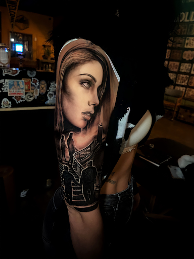 Explore neck tattoo idea, creative tattoo ideas in Johnson City, available at Gold Cross Tattoo Co.