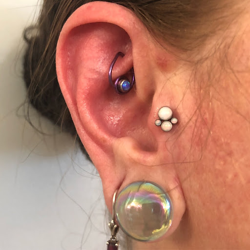 Explore cover up ideas for small tattoos, creative tattoo ideas in Bloomington, available at Crimson Breed Tattoo Studio