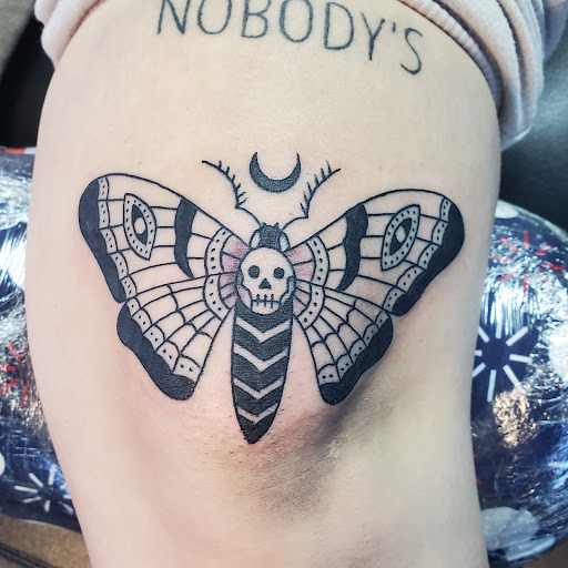 Explore woman leg tattoo ideas, creative tattoo ideas in Reno, available at Evolution Tattoo