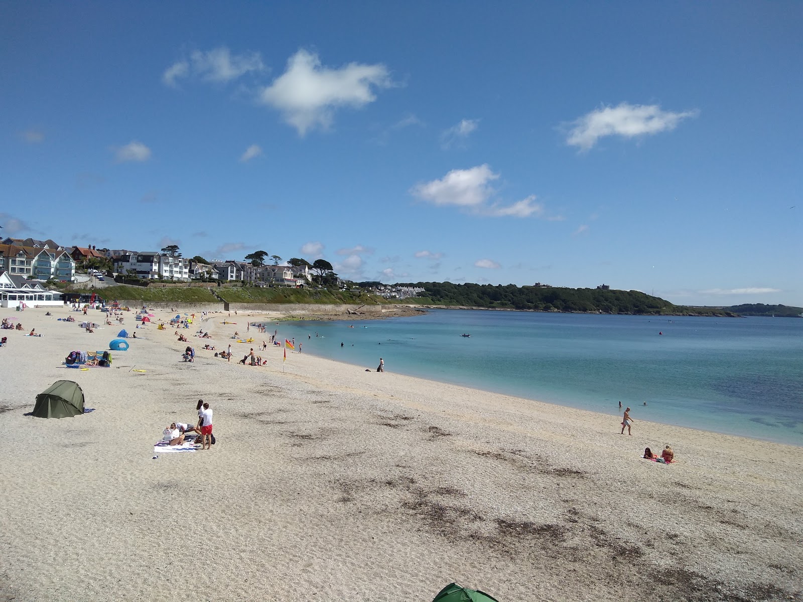 Photo of Gyllyngvase Beach with turquoise pure water surface