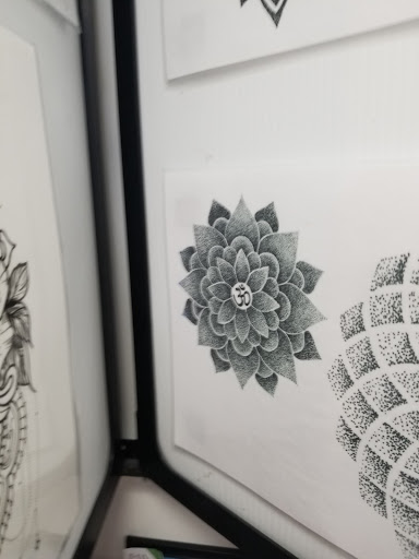 Explore half sleeve flower tattoo ideas, creative tattoo ideas in Madison, available at Ultimate Arts Tattoo