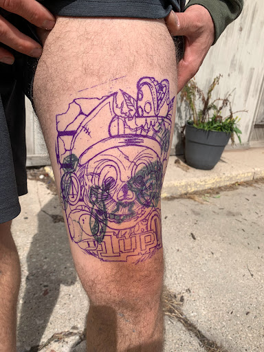 Explore leg sleeve tattoo ideas for guys, creative tattoo ideas in Green Bay, available at Darkside Tattoo By Jesse Skywalker