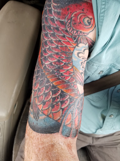 Explore tattoo for men ideas, creative tattoo ideas in Charleston, available at Holy City Tattooing Collective