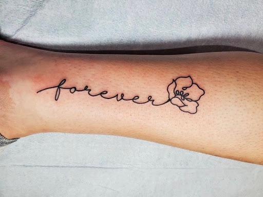 Explore fist bump tattoo ideas, creative tattoo ideas in Libertyville, available at Lucky Seven Tattoo
