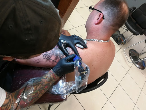 Tattoo Shop «Rise Above Tattoo», reviews and photos, 1009 N Mills Ave, Orlando, FL 32803, USA