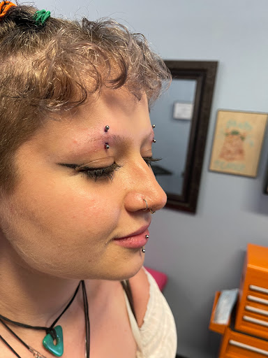 Explore memorial tattoo ideas for men, creative tattoo ideas in Palm Harbor, available at Angry Owl Tattoo and Piercing