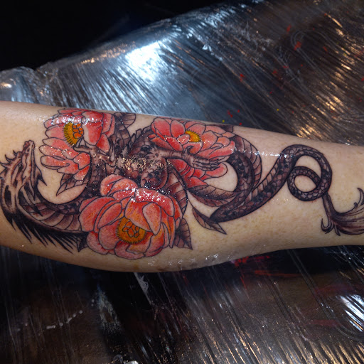 Explore soundwave tattoo ideas, creative tattoo ideas in Oceanside, available at Frontline Tattoo Co