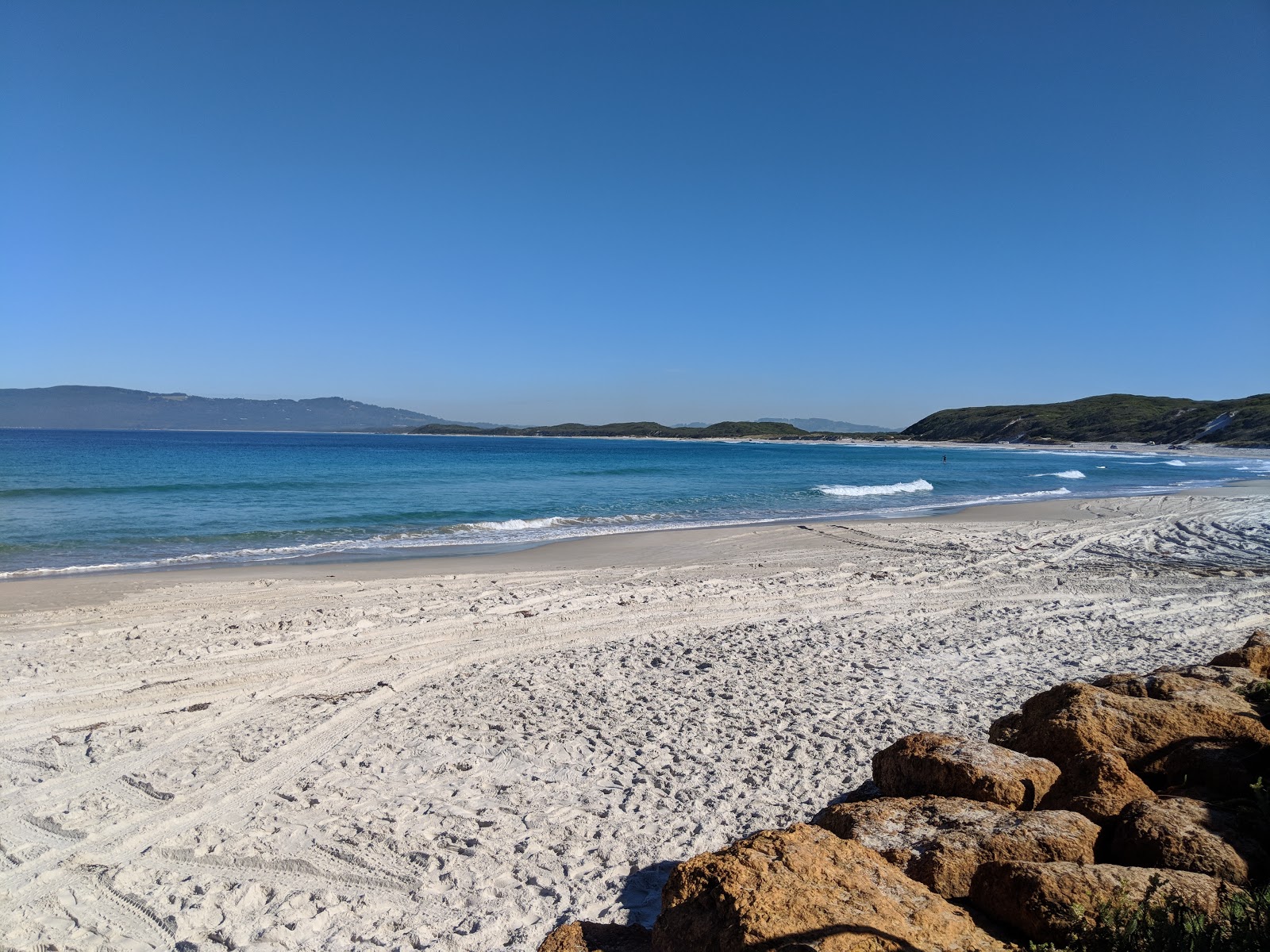 Muttonbird Beach'in fotoğrafı düz ve uzun ile birlikte