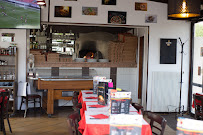 Atmosphère du Pizzeria L'ARC EN CIEL PIZZA AU FEU DE BOIS à Morangis - n°8