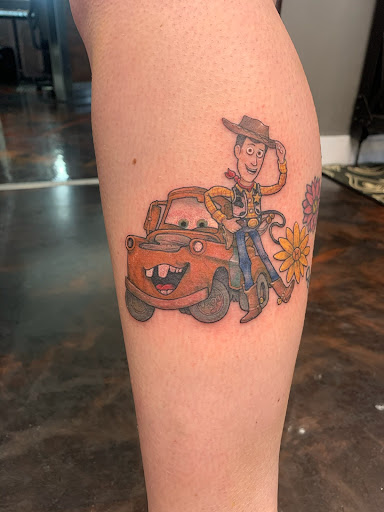 Explore wall-e tattoo ideas, creative tattoo ideas in Roy, available at Garden Gate Tattoo & Art Collective