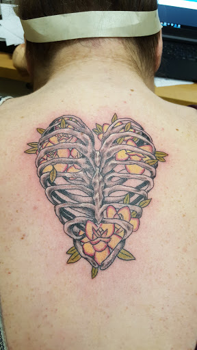 Explore men neck tattoo ideas, creative tattoo ideas in Tewksbury, available at Lucid Arts Tattoo Studio