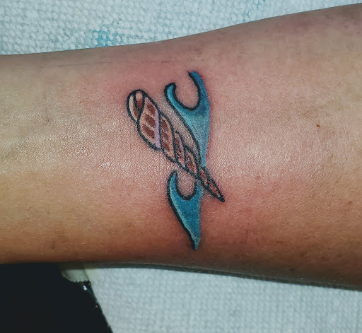 Explore purple heart tattoo ideas, creative tattoo ideas in Englewood, available at The Original Big Daddy Tattoo & Body Piercing est.1997 est.1997