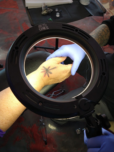 Explore spine tattoo ideas for men, creative tattoo ideas in Las Vegas, available at Las Vegas Tattoo Collective, LLC