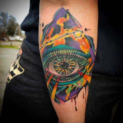 Explore sheet music tattoo ideas, creative tattoo ideas in Gadsden, available at Sacred Art Tattoo Company