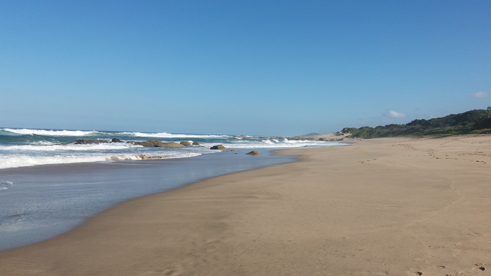 Foto de Granny's Tidal beach com areia brilhante superfície