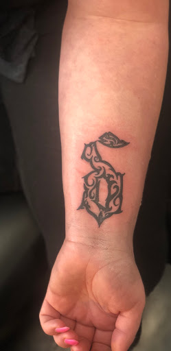 Explore flower shoulder tattoo ideas, creative tattoo ideas in Barberton, available at Magic City Tattoo Company