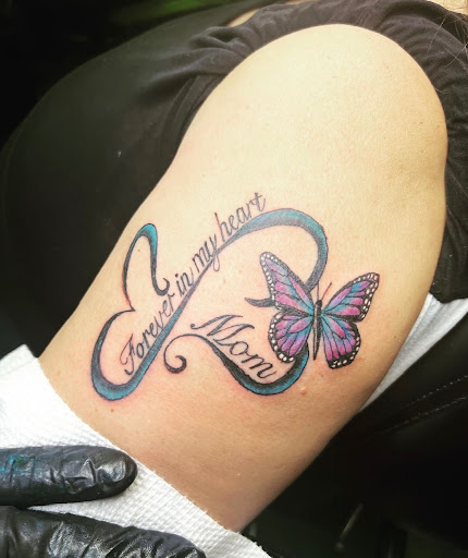 Find family symbol tattoo ideas for your next unique tattoo in Peoria at Modern Ink Tattoo