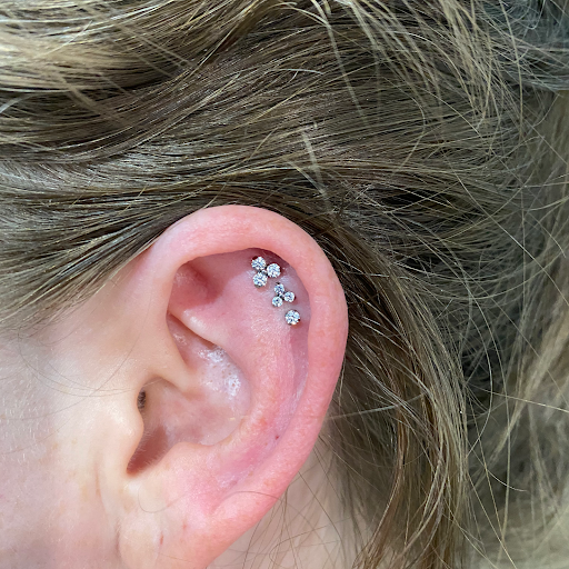 Find gym tattoo ideas for men for your next unique tattoo in Lansing at Be-You-tiful Body Piercing & Fine Jewelry