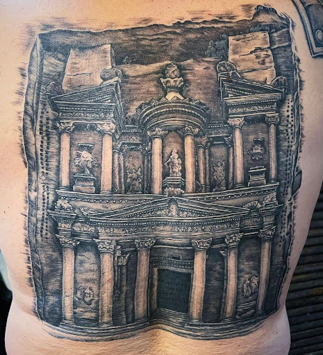 Explore tattoo ideas for men arm sleeve, creative tattoo ideas in Grand Island, available at The Shaded Dahlia Piercing & Tattoo Parlor