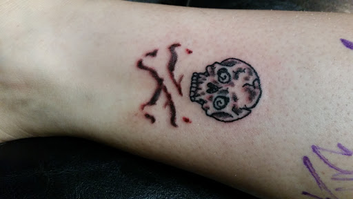 Explore bear family tattoo ideas, creative tattoo ideas in Erie, available at EliKingInk