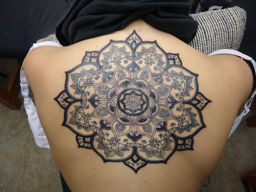 Explore slash tattoo ideas, creative tattoo ideas in New Bern, available at Firehouse Tattoo.