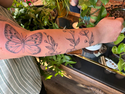 Explore small red tattoos ideas, creative tattoo ideas in Virginia Beach, available at The Collective Tattoo & Body Piercing