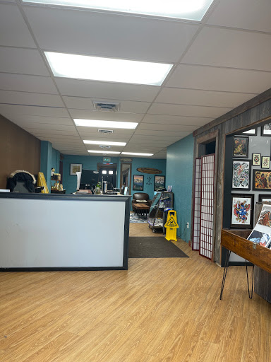 Explore guy shoulder tattoo ideas, creative tattoo ideas in Madison, available at Lost Lakes Tattoo