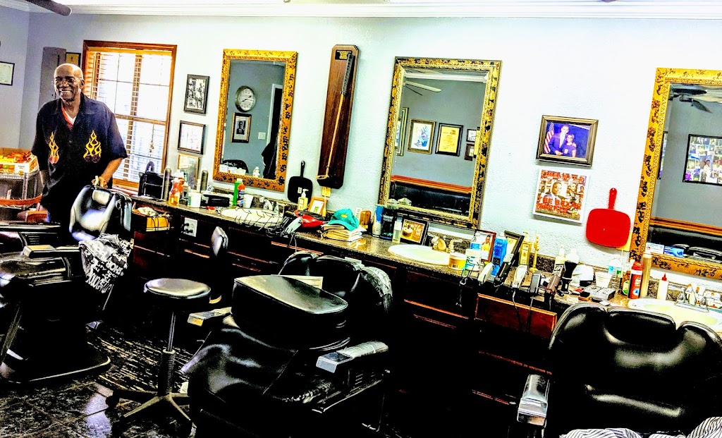 Tyrone's Barber & Beauty Shop 39530