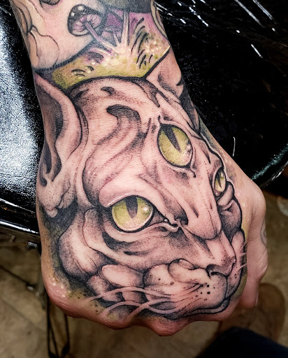 Explore small red tattoos ideas, creative tattoo ideas in Fuquay Varina, available at 401 Tattoo and Antiquities