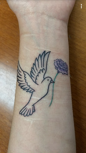 Explore jawline tattoo ideas, creative tattoo ideas in Bridgeport, available at Evolution Tattoo