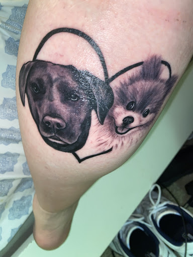 Explore dog paw print tattoo ideas, creative tattoo ideas in Shallotte, available at Ocean Isle Ink & Piercing