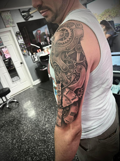 Explore grandfather tattoo ideas, creative tattoo ideas in Fort Myers, available at Loyal 2 The Coil Tattoos & Piercings (Edison Mall Location Entrance F)