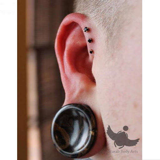 Explore hand tattoo ideas female, creative tattoo ideas in Syracuse, available at Scarab Body Arts