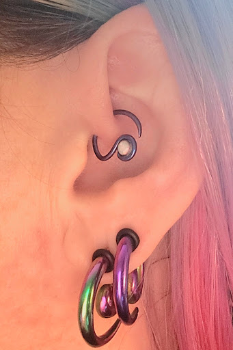 Explore hellsing tattoo ideas, creative tattoo ideas in Chapel Hill, available at Spica Body Piercing