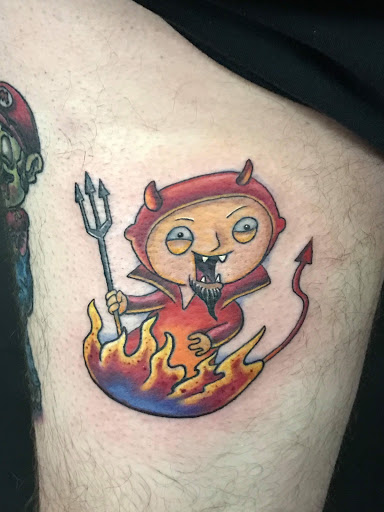 Explore anime leg tattoo ideas, creative tattoo ideas in Oklahoma City, available at Mind Bender Tattoo