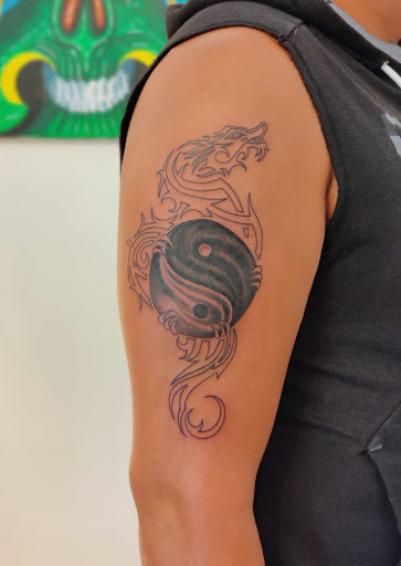 Explore left arm tattoo ideas, creative tattoo ideas in Hebron, available at Explosive Ink Tattoo