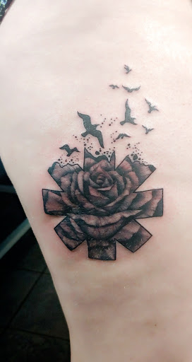 Explore tattoo cartoon ideas, creative tattoo ideas in Toledo, available at Infinite Art Tattoo Studio