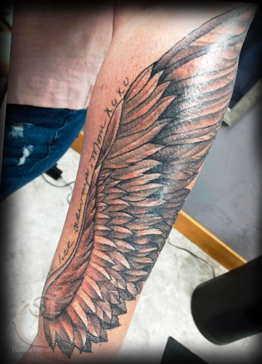 Explore sun tattoo ideas for females, creative tattoo ideas in Houlton, available at Crowes Tattoos