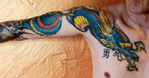 Explore american traditional elbow tattoo ideas, creative tattoo ideas in Brainerd, available at One Life Tattoo Studio