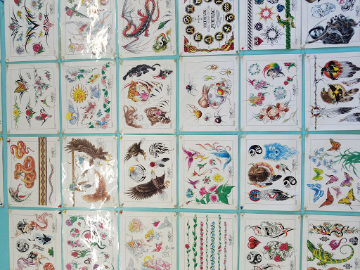 Explore family tattoo ideas, creative tattoo ideas in Lima, available at White Wizard Tattoo & Body Piercing