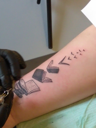 Tattoo Shop «The Shop», reviews and photos, 141 S Grand Ave, Fowlerville, MI 48836, USA