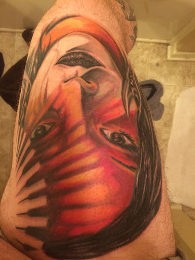 Explore hunter tattoo ideas, creative tattoo ideas in Pelham, available at Tattoo Expression