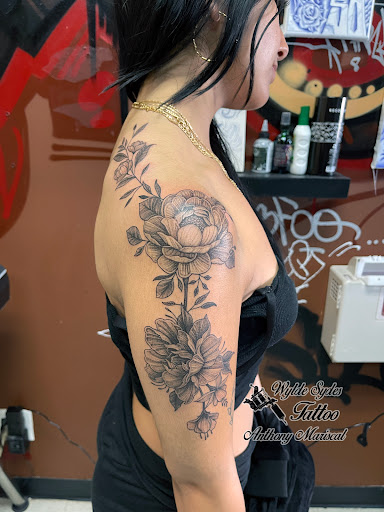 Explore red ink tattoo ideas for guys, creative tattoo ideas in San Diego, available at Wylde Sydes Tattoo & Body Piercing