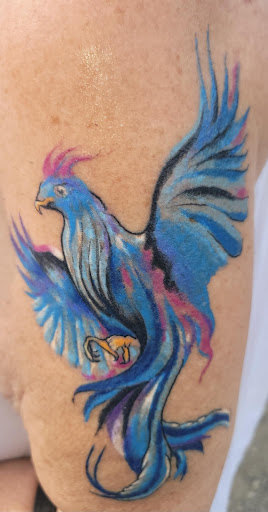 Explore book tattoo ideas for females, creative tattoo ideas in Johnstown, available at Screaming Needle Tattoo & Body Piercing