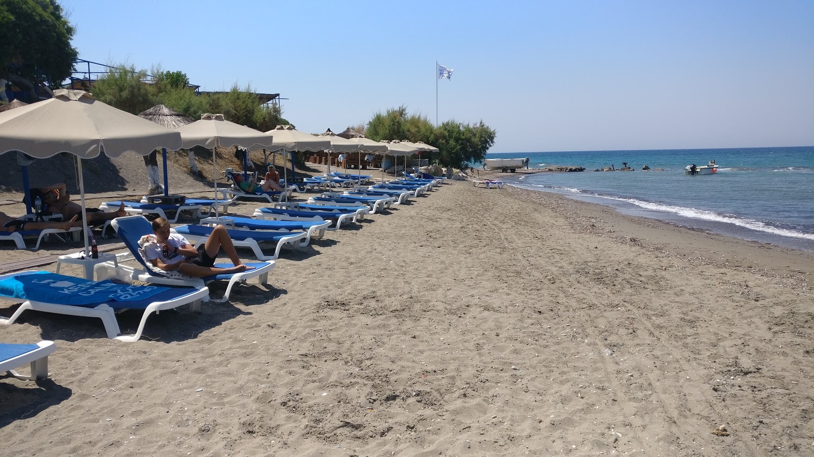 Photo of Kameros Beach IV with gray sand surface