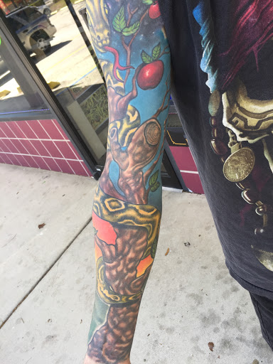 Explore blast over tattoo ideas, creative tattoo ideas in Jacksonville, available at Electric Legacy Tattoo