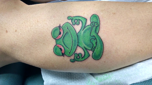 Explore small sleeve tattoo ideas, creative tattoo ideas in Mason City, available at Technicolor Tattoo Studio