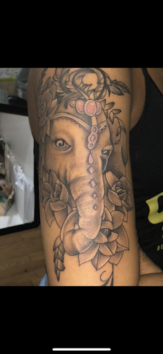 Explore pisces symbol tattoos ideas, creative tattoo ideas in Jamaica, available at Rising Phoenix Ink