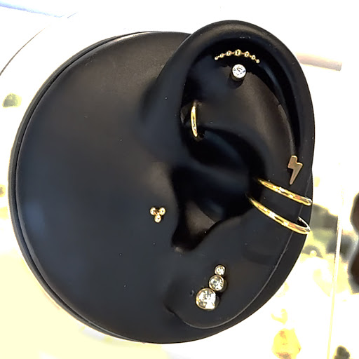 Explore tiger lily tattoo ideas, creative tattoo ideas in San Luis Obispo, available at Bodys & Jewelry Luxury Piercing